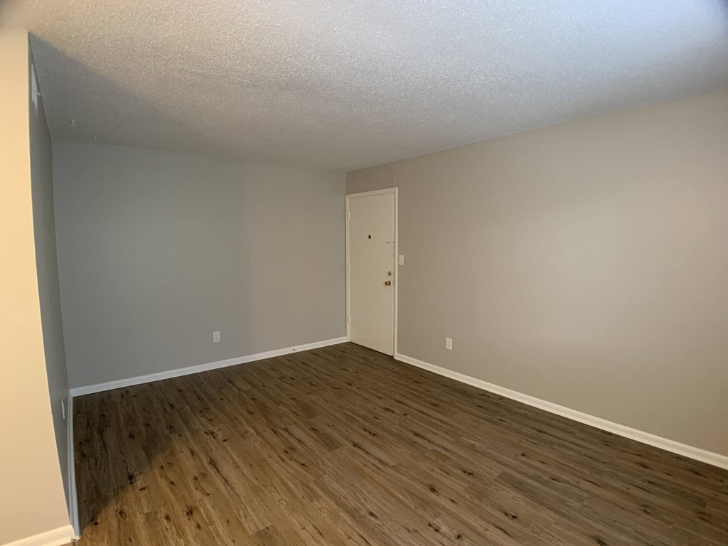 hardwood floor with medium sized window