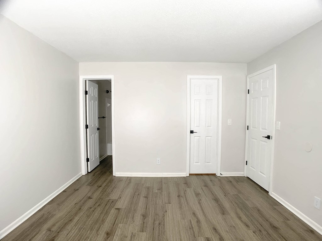Photo of bedroom with view of closet and hallway in Kansas City.