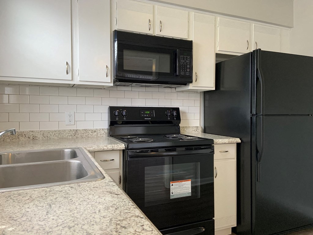 Fully equipped kitchen at Chouteau Heights