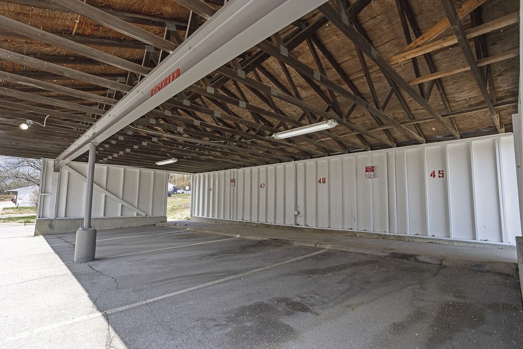the inside of a building with wooden ceilings and beams