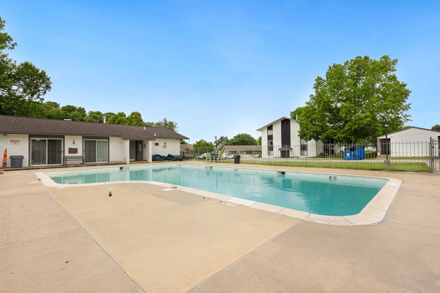 the preserve at ballantyne commons community swimming pool with apartment buildings