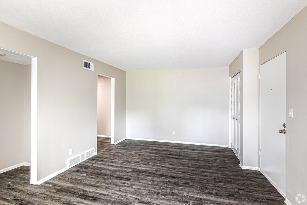 Living room with vinyl plank flooring and natural light in kansas city