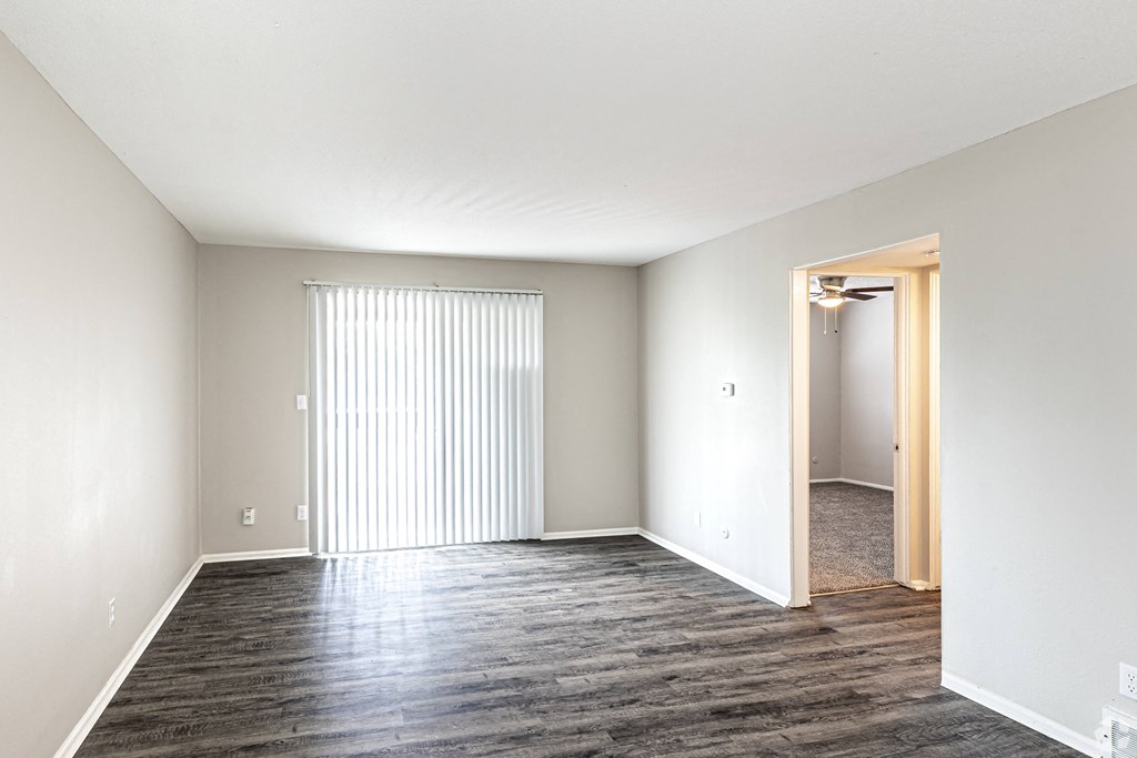 Living room with vinyl plank flooring and natural light in kansas city