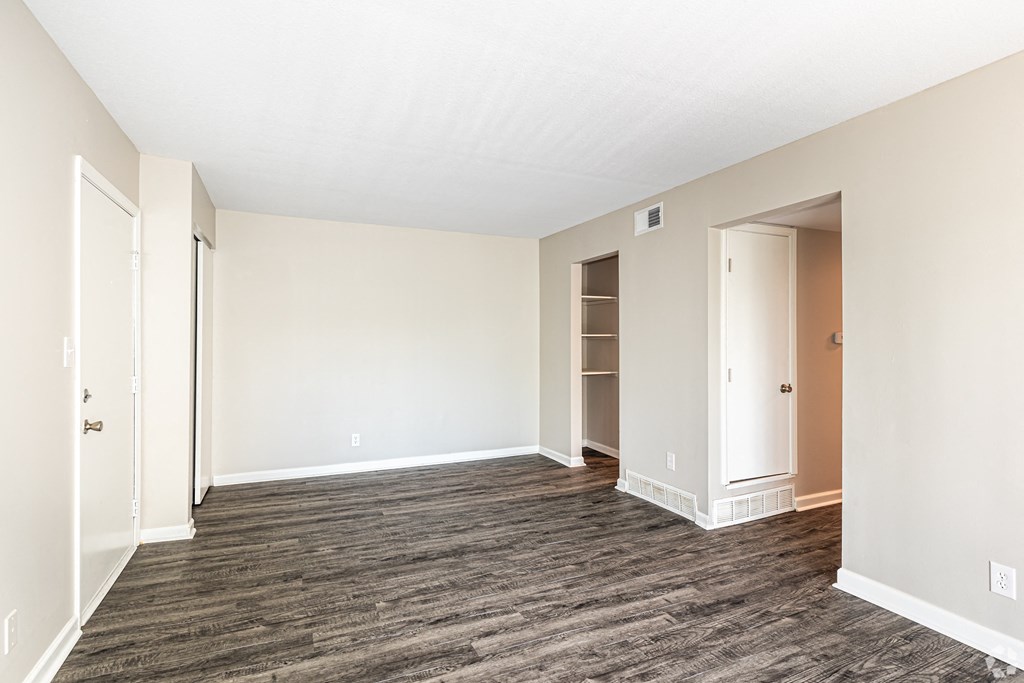 Living room with vinyl plank flooring and natural light in kansas city