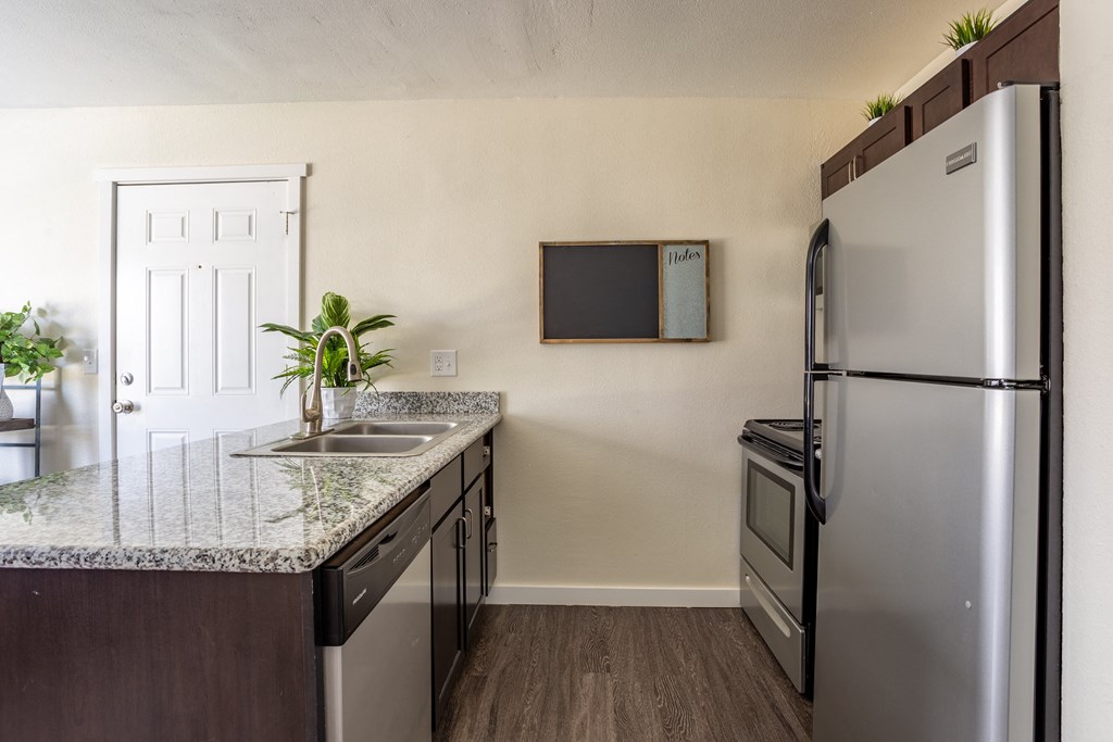 Kitchen with appliances at Bennett Ridge in Oklahoma