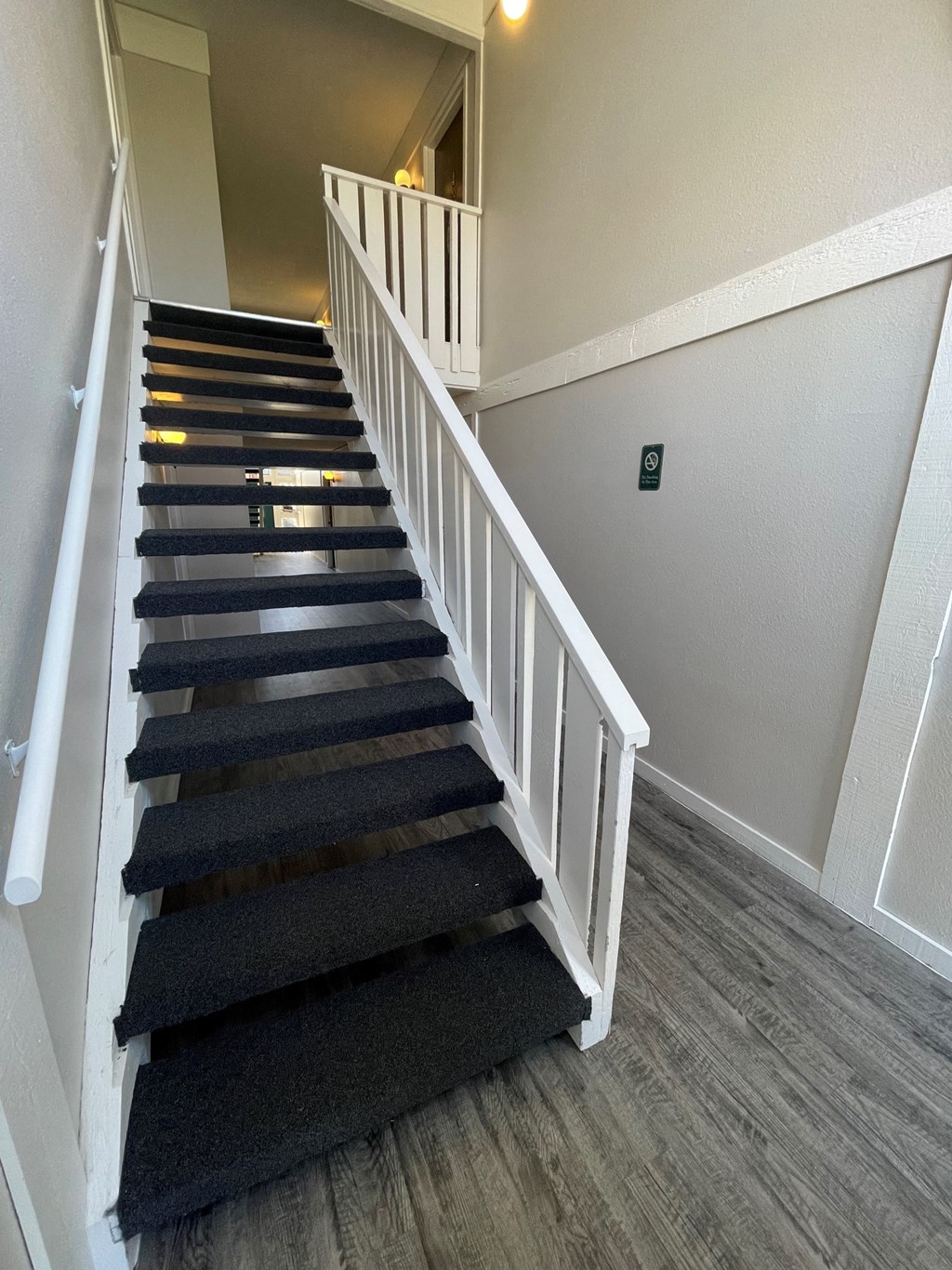 a view of the stairway from the bottom of the stairs