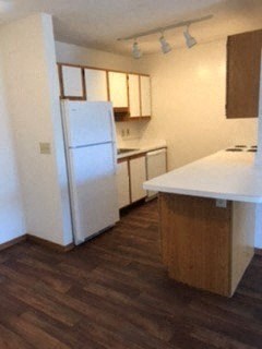 Kitchen with appliances and cabinet