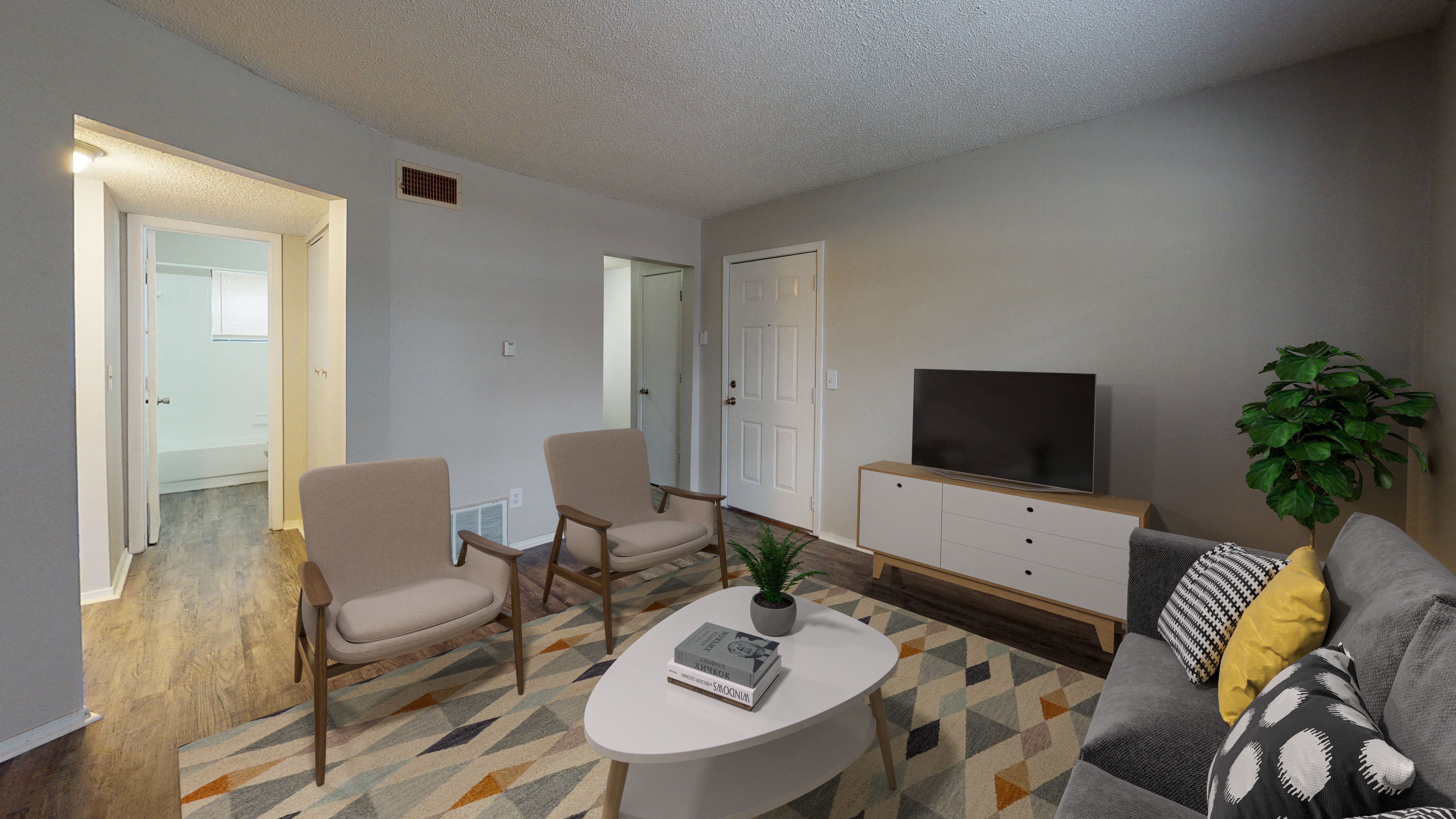 Spacious living room with vinyl flooring