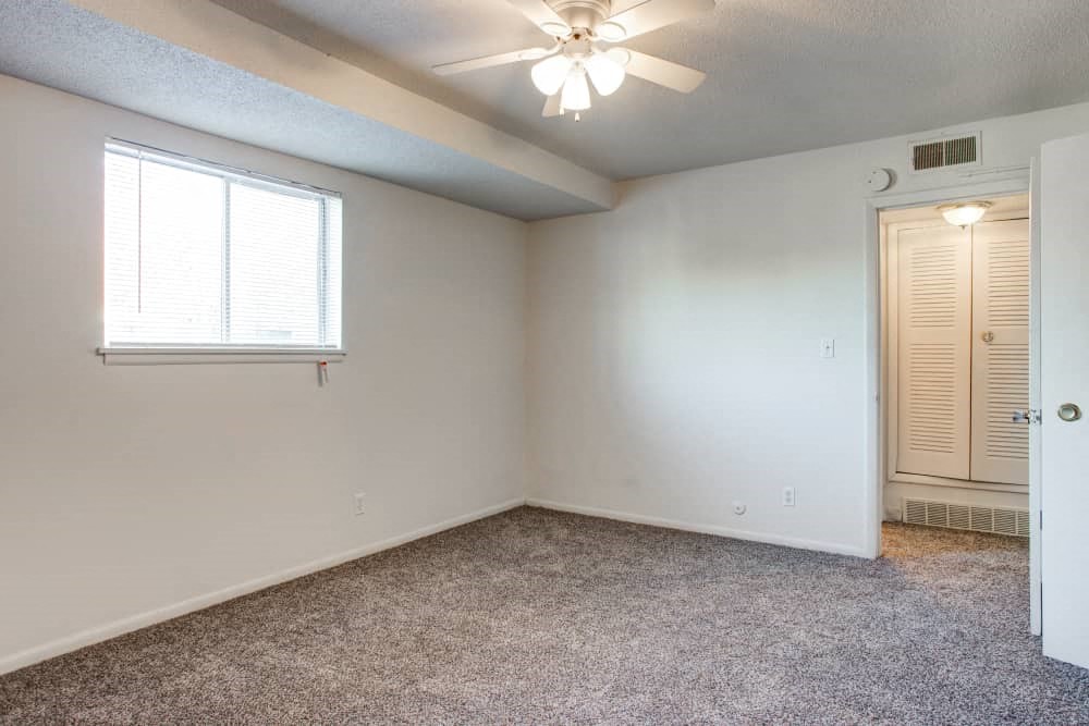 Interior view of bedroom with large window