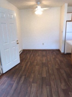 Large room with plank flooring