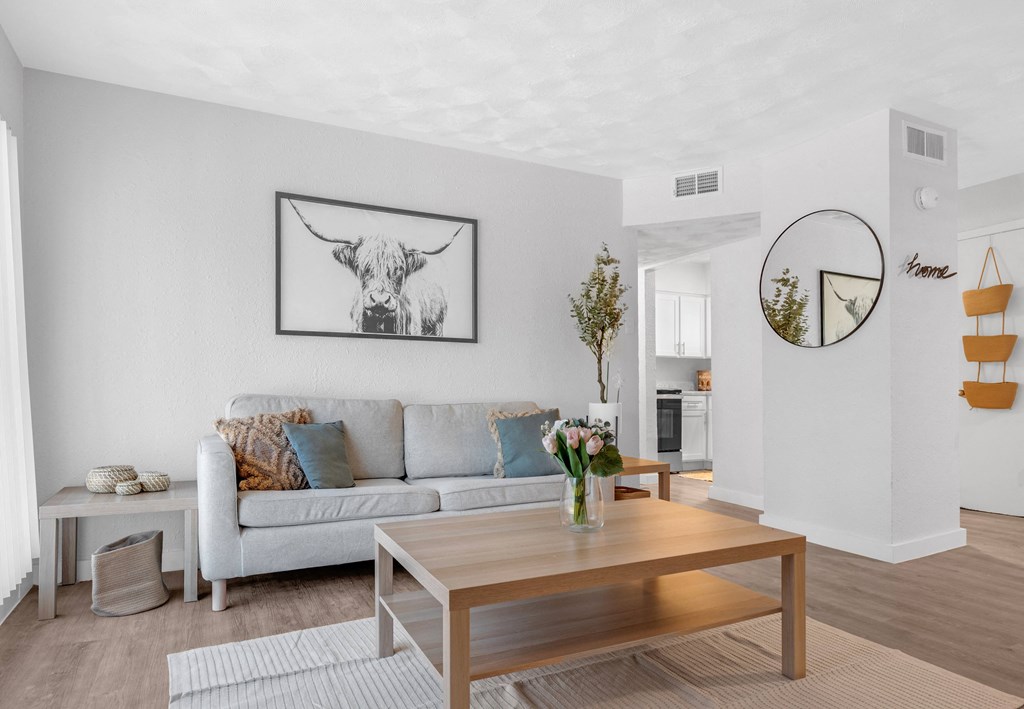 a living room with a couch and a table