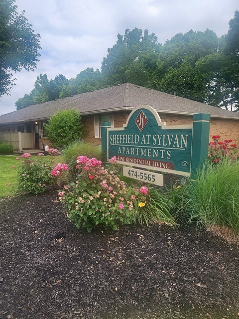 Property sign with flowers at Sheffield at Sylvan in Ohio