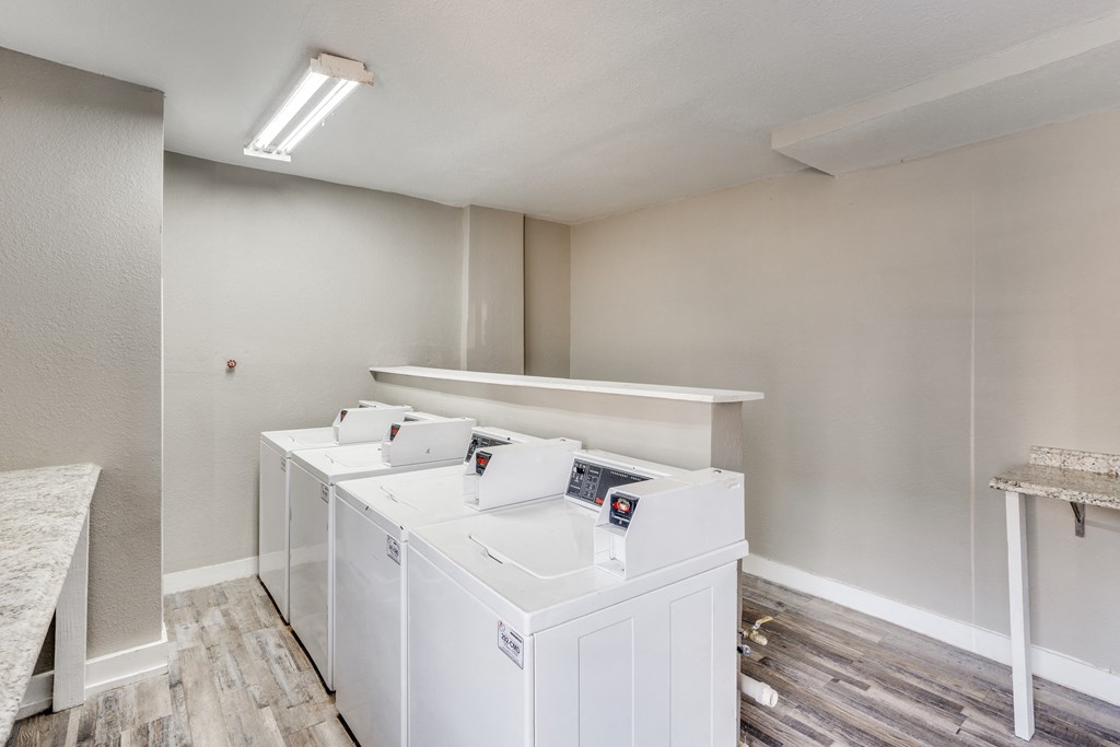 the preserve at ballantyne commons laundry room with washes and dryers