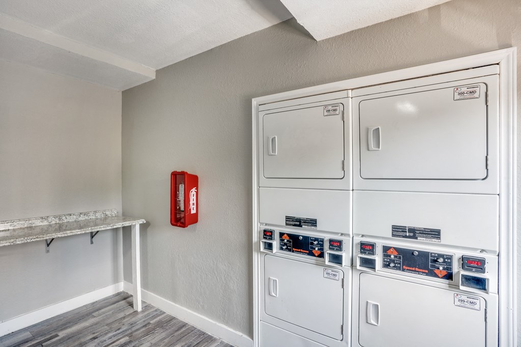 the preserve at green tree apartments laundry room with washer and dryer