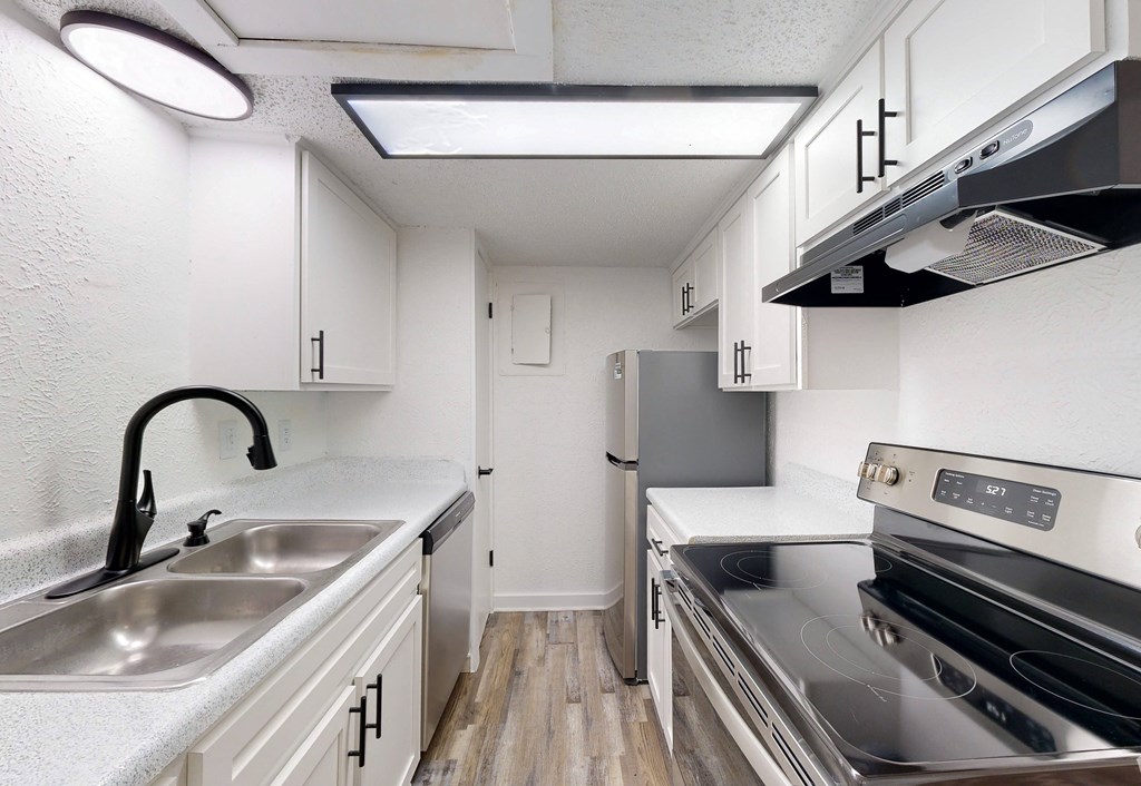 the preserve at ballantyne commons apartment kitchen with stainless steel appliances