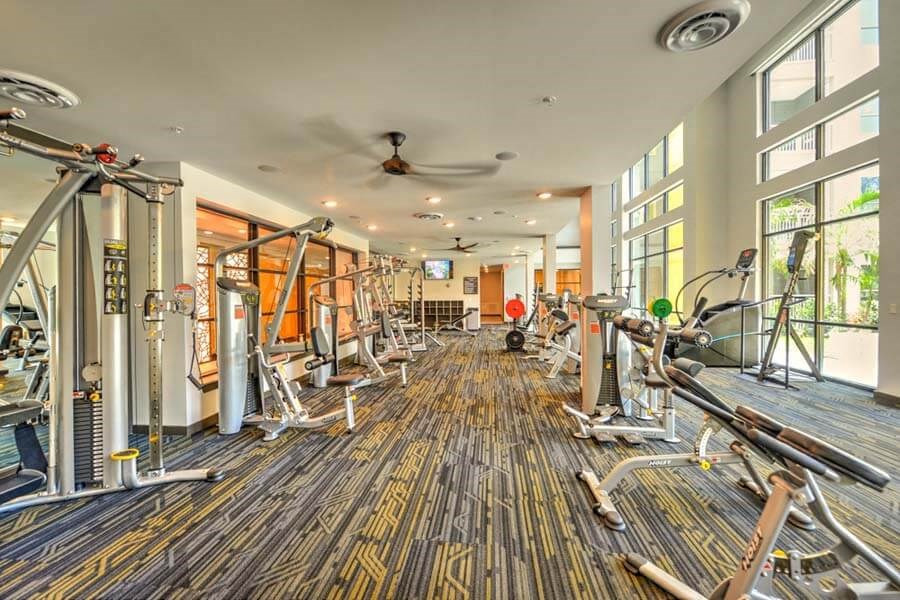 a room filled with lots of different types of exercise equipment  at Fusion, Florida, 32256