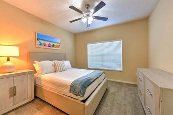 Spacious bedrooms with a ceiling fan  at Ocean Park, Florida