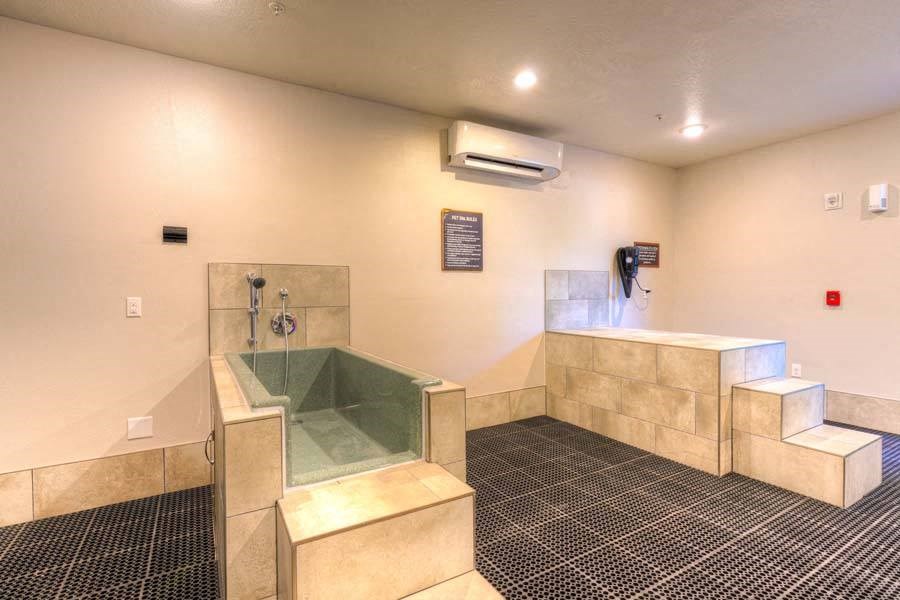 a large bathroom with a tub and a shower  at Fusion, Florida, 32256