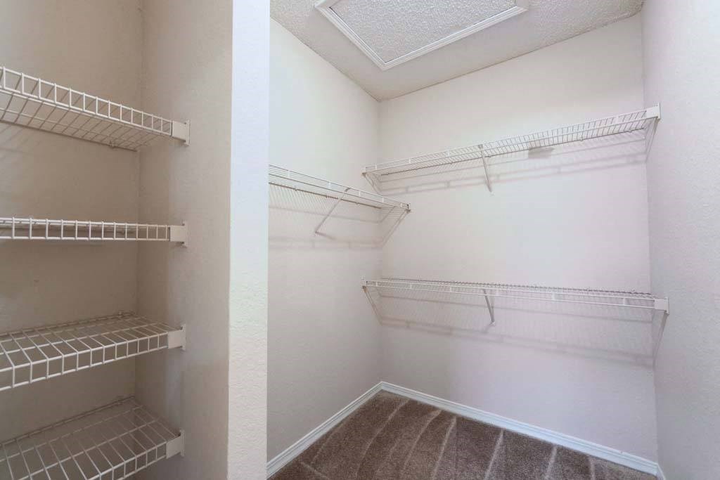 a walk in closet in a bedroom  at Ocean Park, Florida, 32250