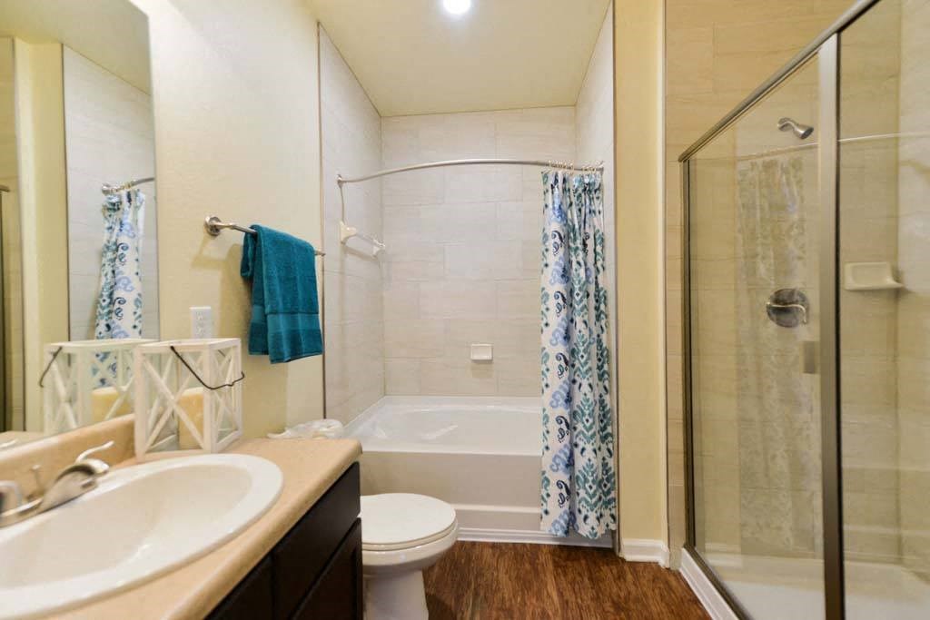 a bathroom with a sink toilet and shower  at Cabana Club - Galleria Club, Jacksonville