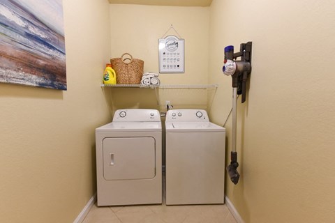 Two washing machines in a small room at Cabana Club - Galleria Club Apartments, Jacksonville, FL