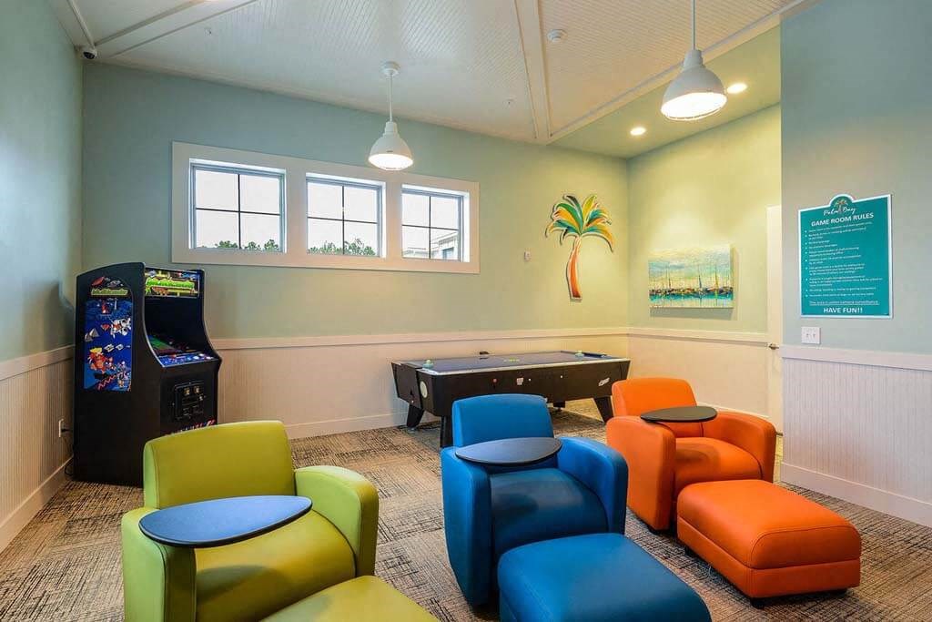 a game room with a foosball table and a pool table  at Palm Bay Club, Jacksonville, FL