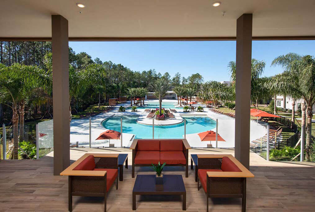 a view of the resort pool from the lobby