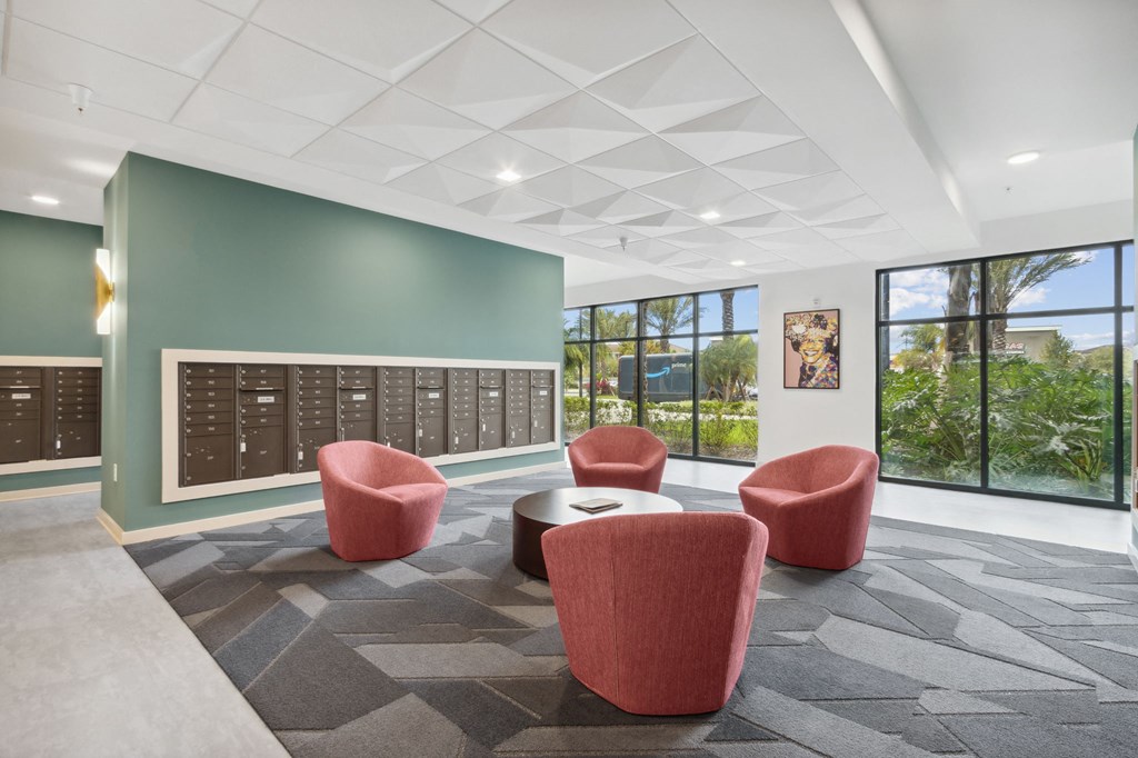 A room with a grey carpet and a white ceiling with a skylightat Pinnacle Apartments, Jacksonville, FL