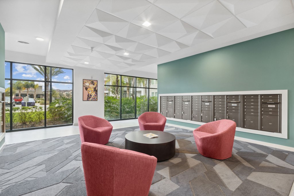 A room with a table and chairs and a window with a view of the outsideat Pinnacle Apartments, Jacksonville, FL