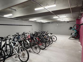 a bunch of bikes parked in a parking garage at Pinnacle Apartments, Jacksonville, 32256
