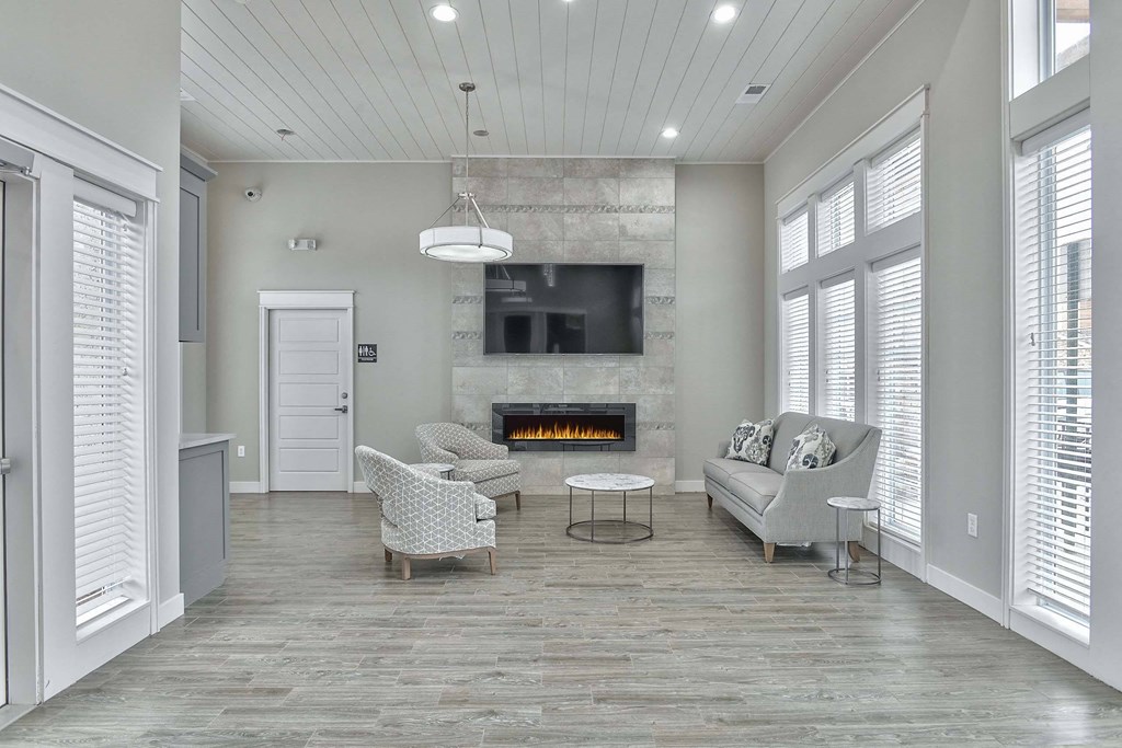 a living room with a couch and a fireplace