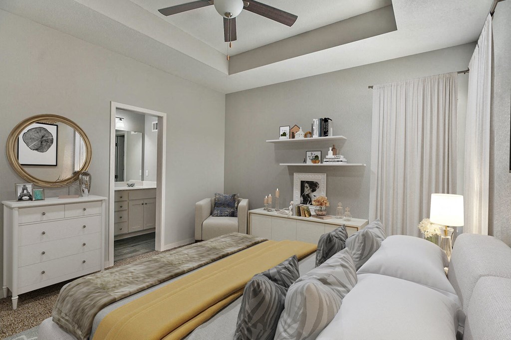 a bedroom with a bed and a ceiling fan