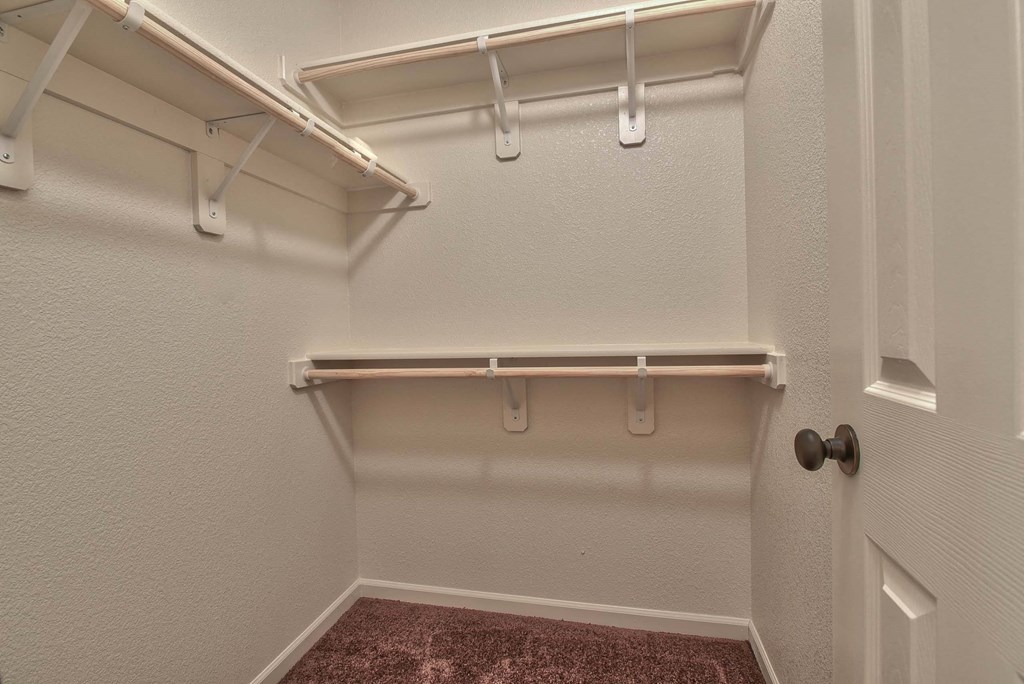 the walk in closet at the preserve at green valley apartments