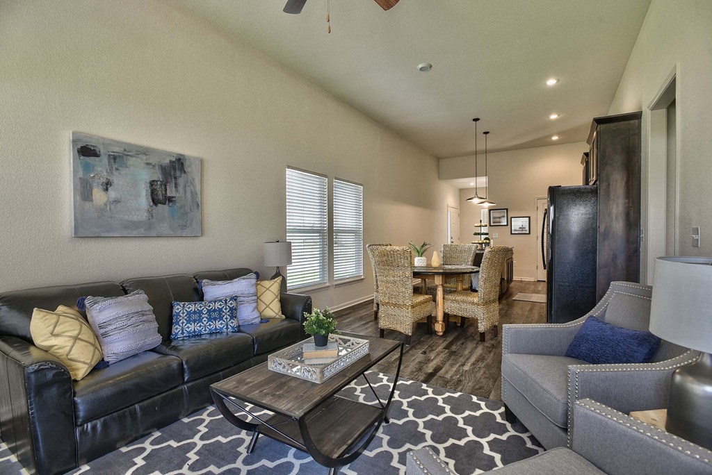 a living room with a couch and a table