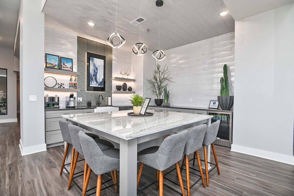 a kitchen with a marble counter top