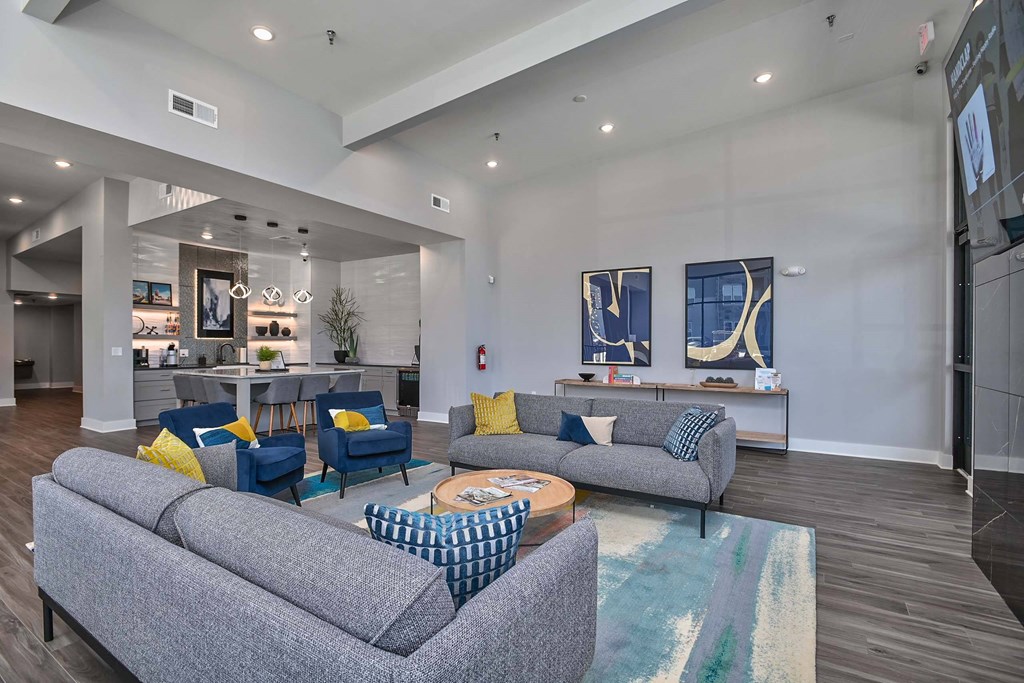 a living room with couches and a coffee table