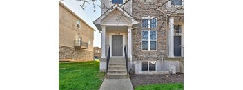 an artistic facade of a building with surfboards on it