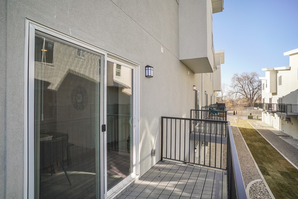 a view of the balcony from the living room