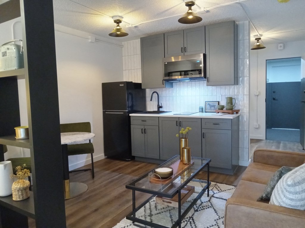 a view of a kitchen from the living room