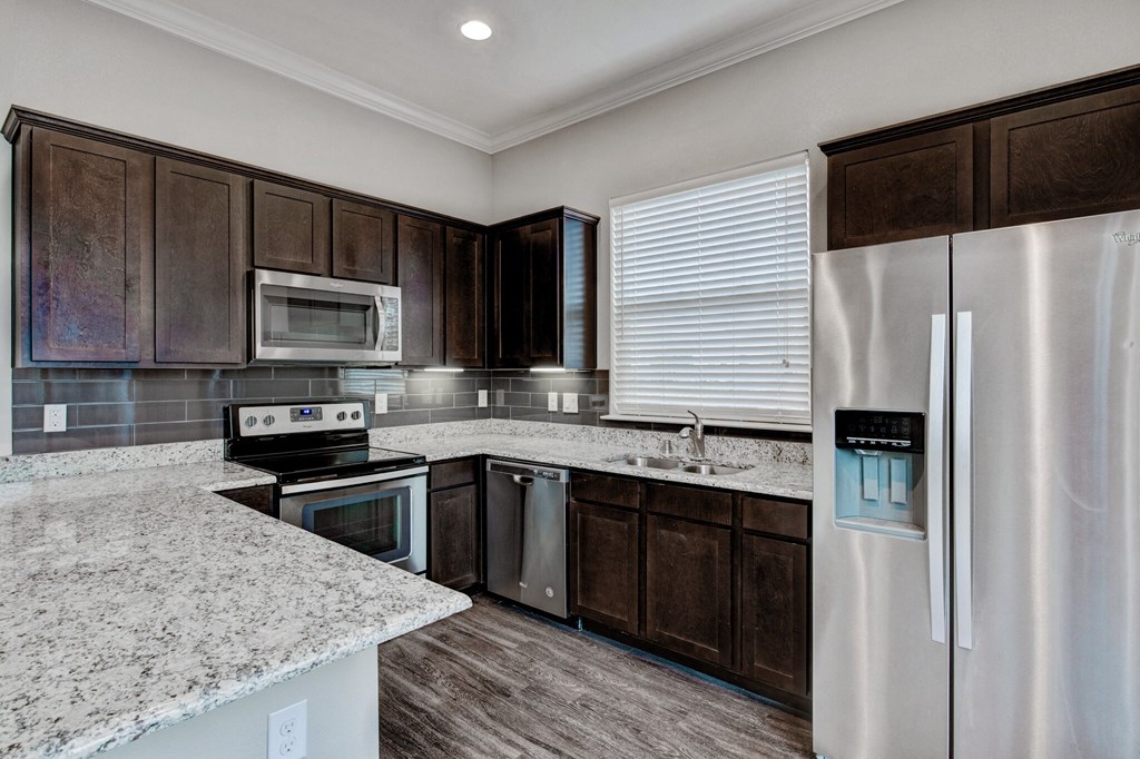 Horizon at Premier apartment interior kitchen with stainless steel appliances Horizon at Premier apartment interior kitchen with stainless steel appliances