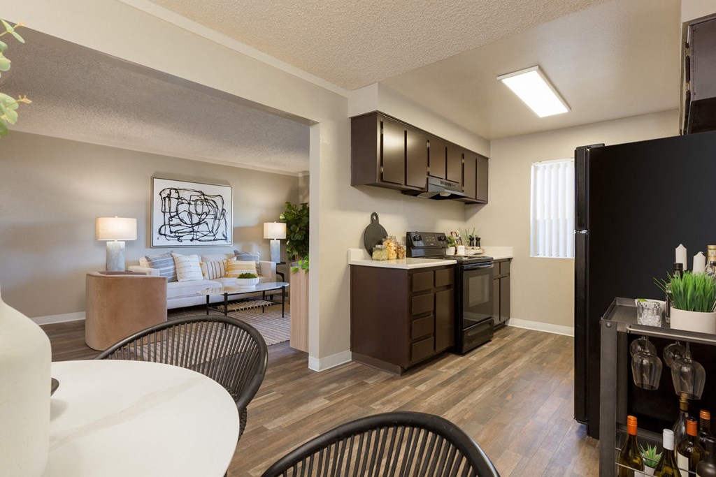 a kitchen and living room in a micro apartment