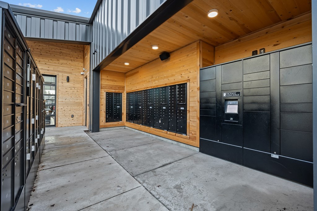 the front door of a building with a sidewalk and a parking meter
