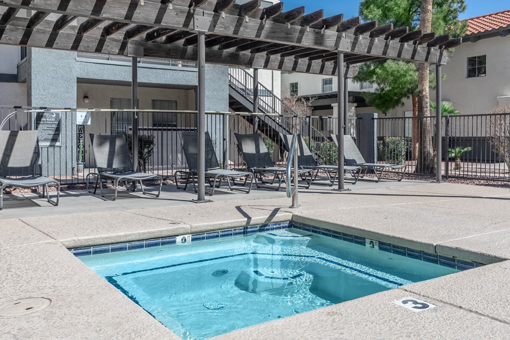 A small pool with a waterfall feature in the middle.