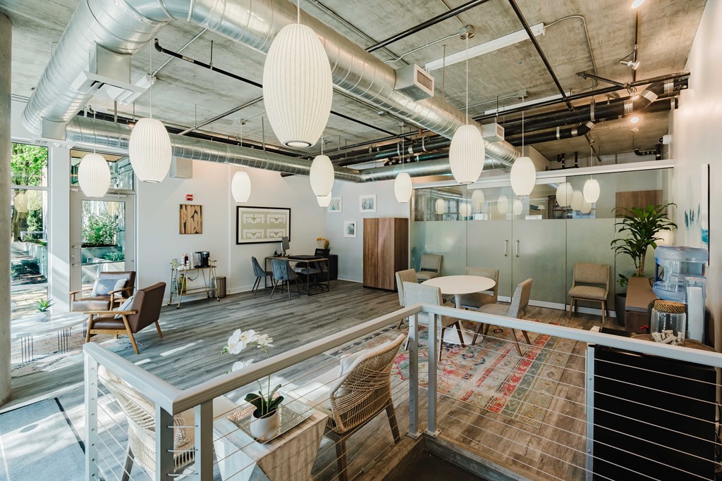 A modern office space with a mix of wood and metal elements.