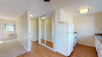 The Crossing at Arroyo Trail One Bedroom One Bathroom kitchen and living room. - Photo Gallery 4