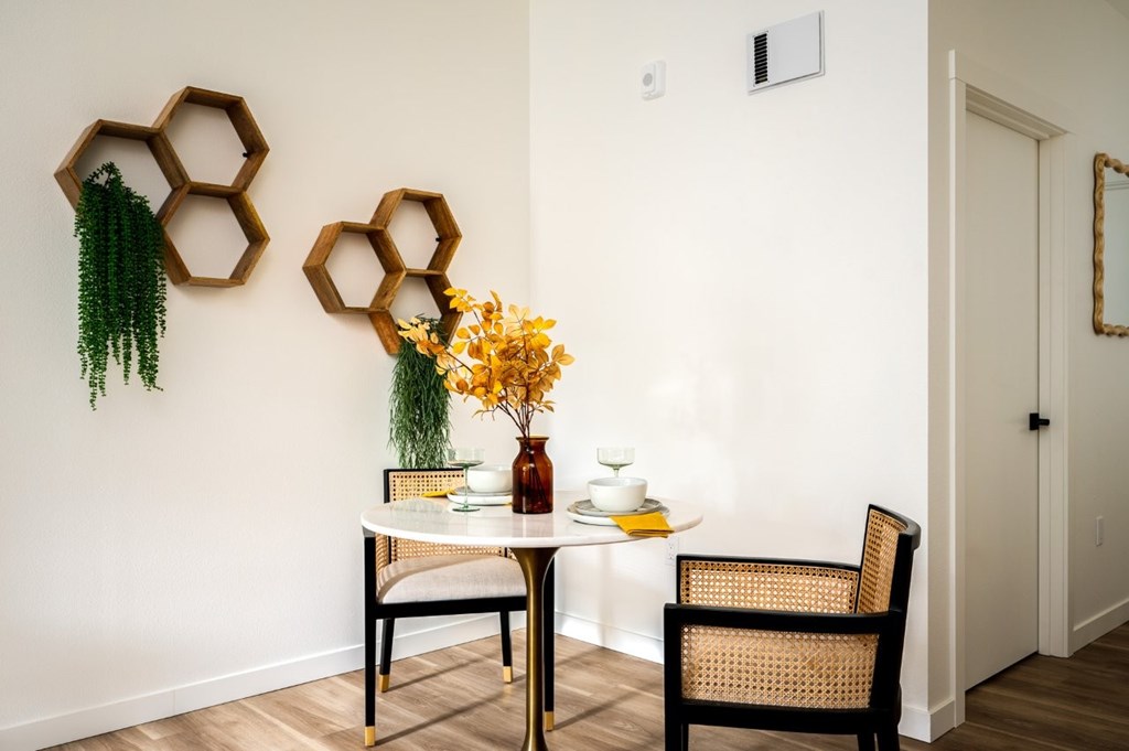 The Wes Gresham Oregon Apartments Dining area with two chairs and dining table