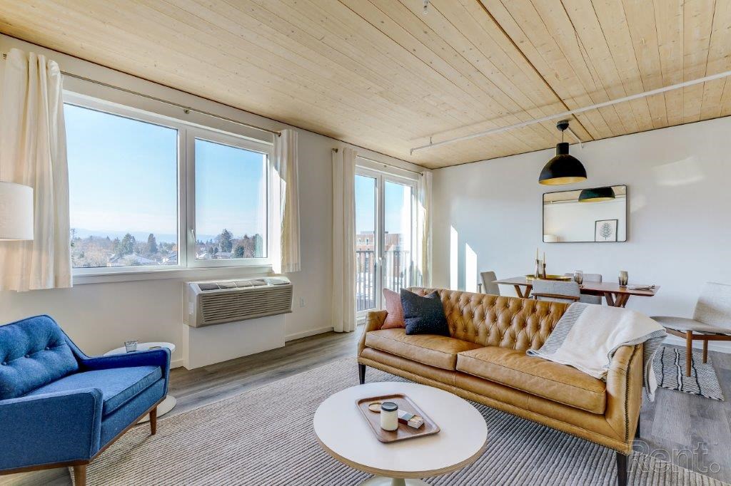 a living room with a couch and a table