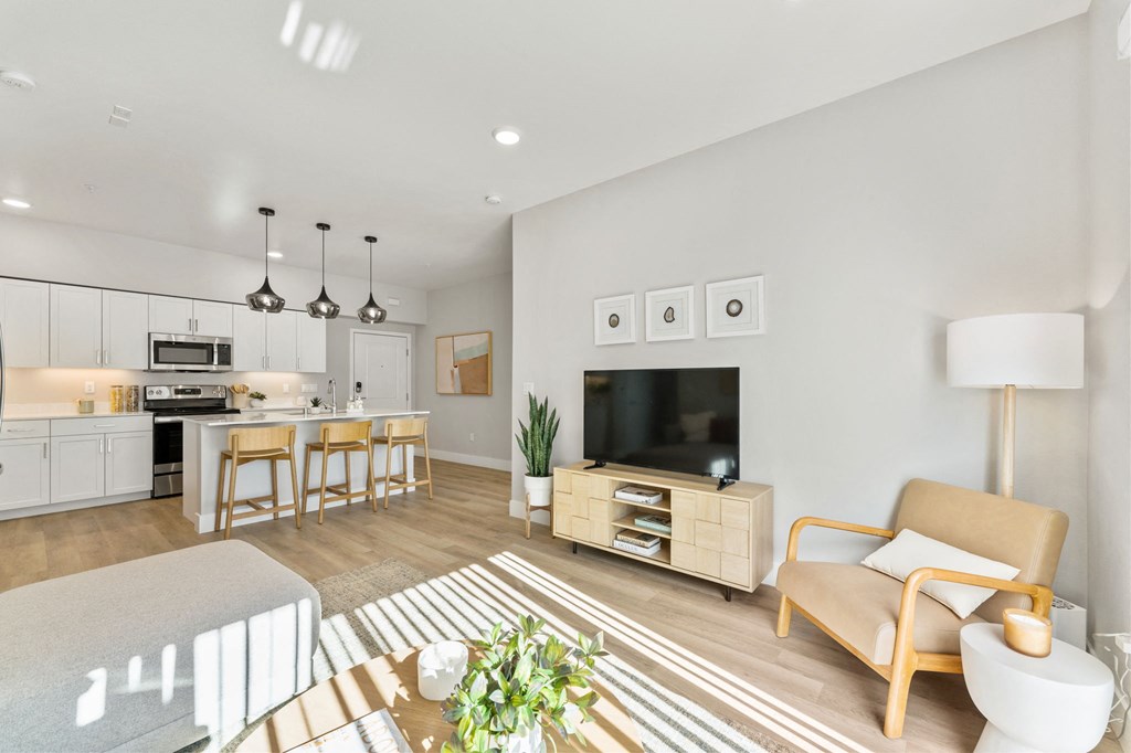 a living room with a couch and a tv