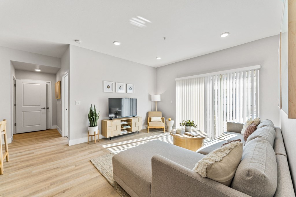 a living room with a couch and a tv