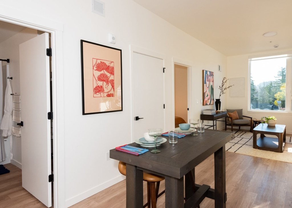 Arts Plaza Gresham Oregon Apartments A dining room with a table set for two.